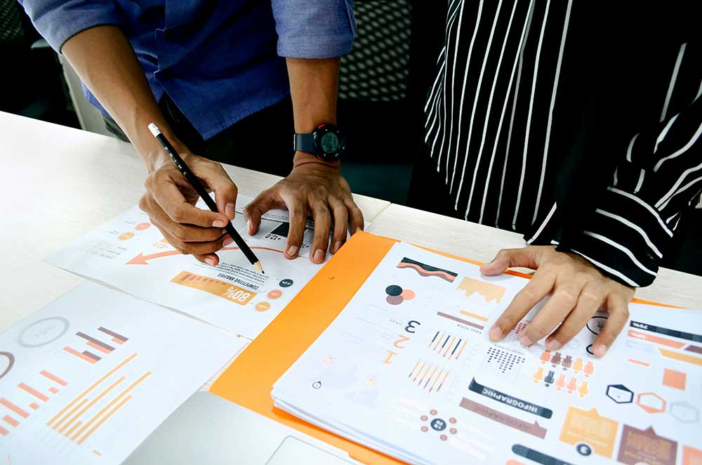 A team reviewing marketing performance charts